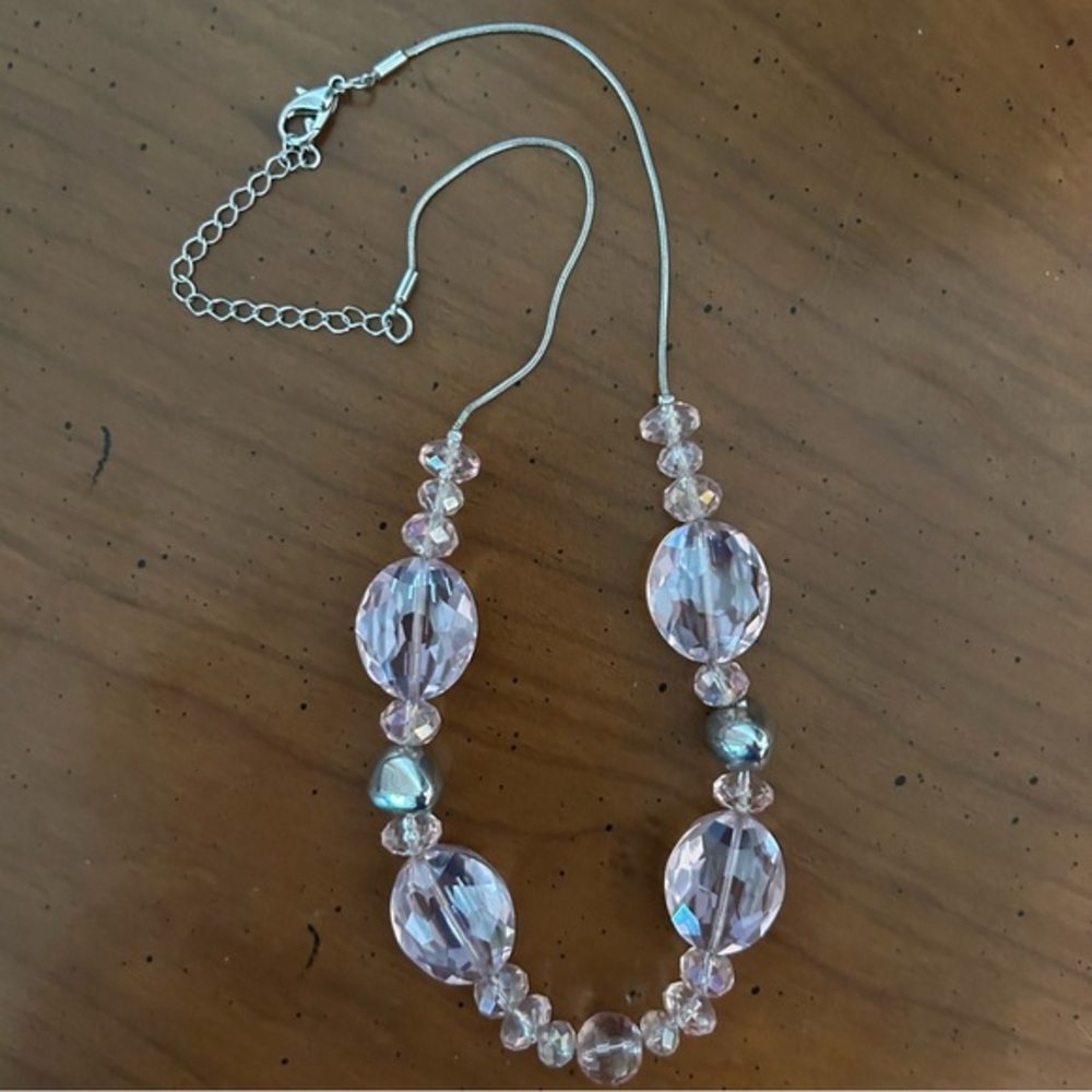 Silver tone necklace with pink and silver beads. Good condition.